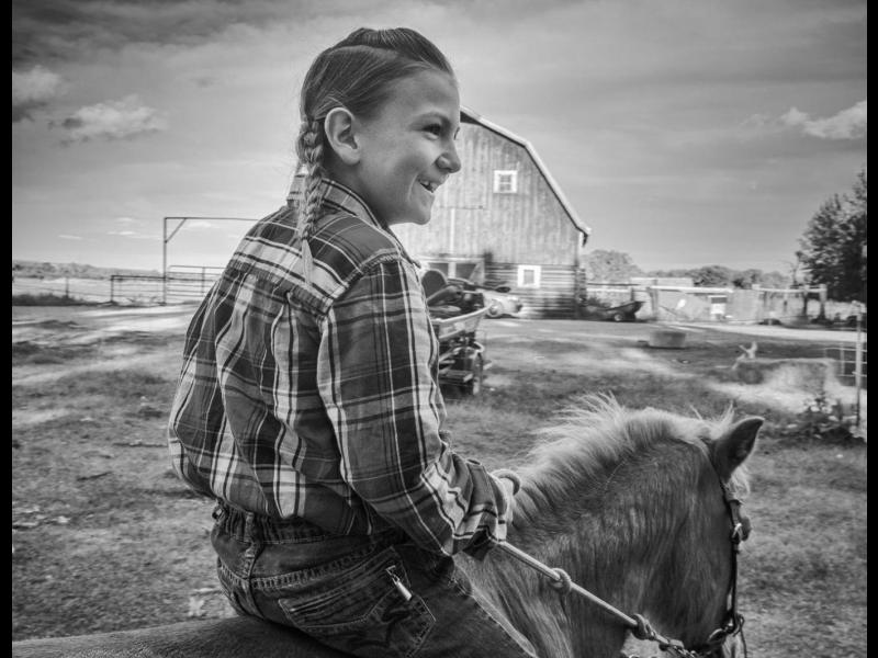 Leo Kipp After a Day Riding to Protect His Grandfather’s Cattle, Browning, Blackfeet Reservation, Montana, 2016 by Sue Reynolds