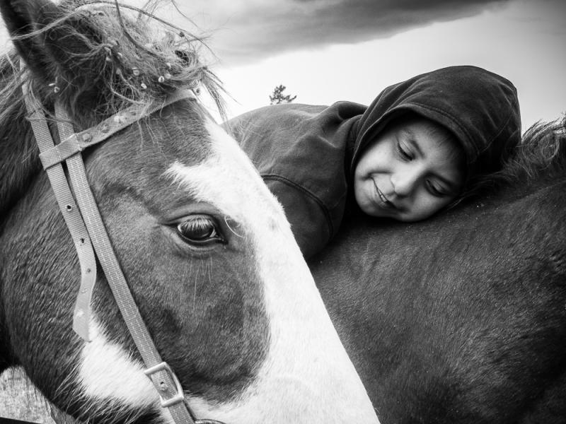 Quinton White Quills at Tom Crawford’s Youth Program, Blackfeet Reservation, Montana, 2015 by Sue Reynolds